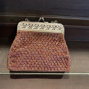 Vintage-Inspired Beaded Clutch with Silver Accents